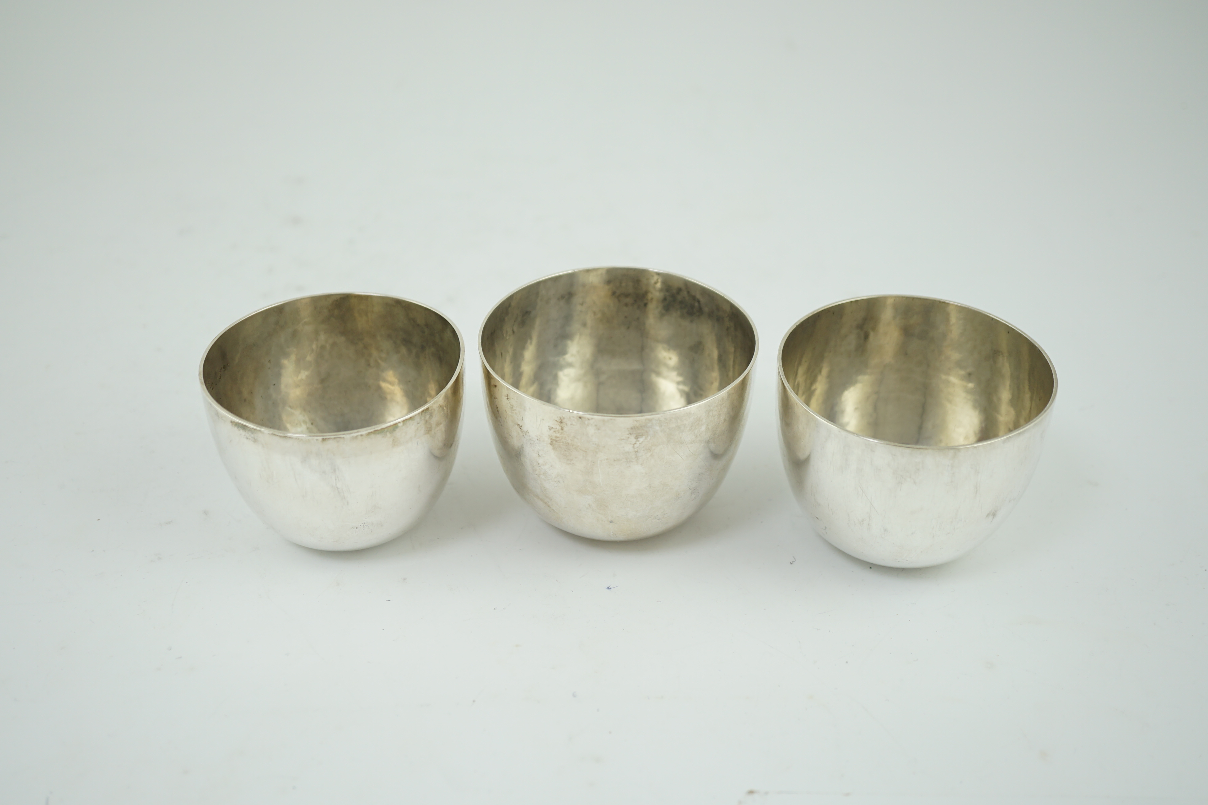 A graduated set of three Victorian silver tumbler cups, by George Gilliam?